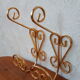 Pair of vintage gold coat hooks