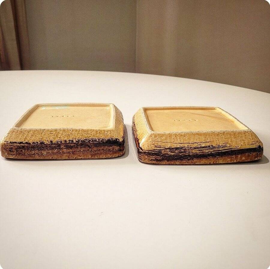 Pair of Aldo Londi pocket emptiers