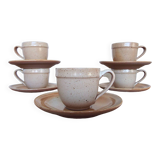 5 cups and saucers in marsh sandstone