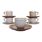 5 cups and saucers in marsh sandstone