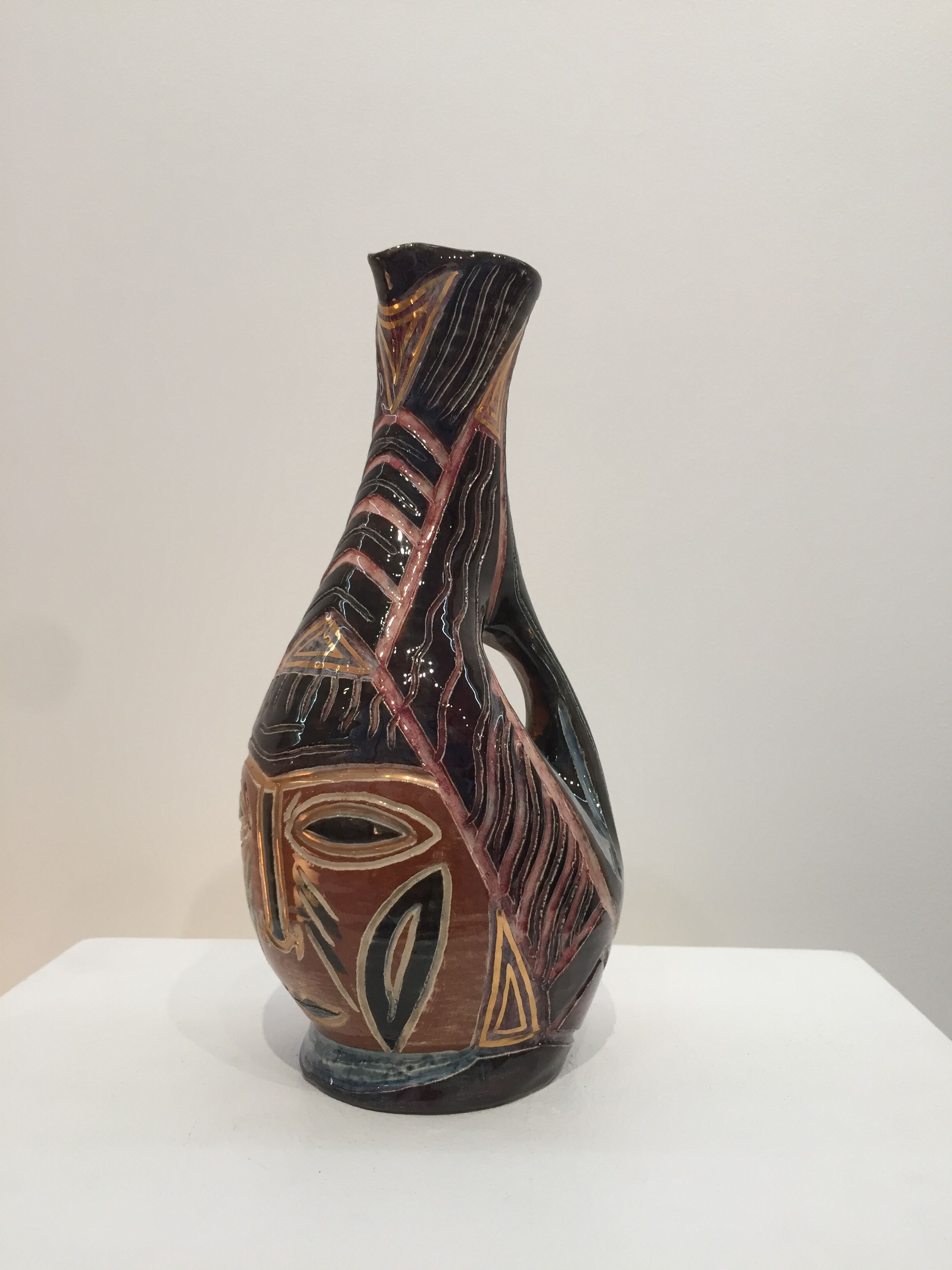 Large pitcher face decoration, signed ACCOLAY.