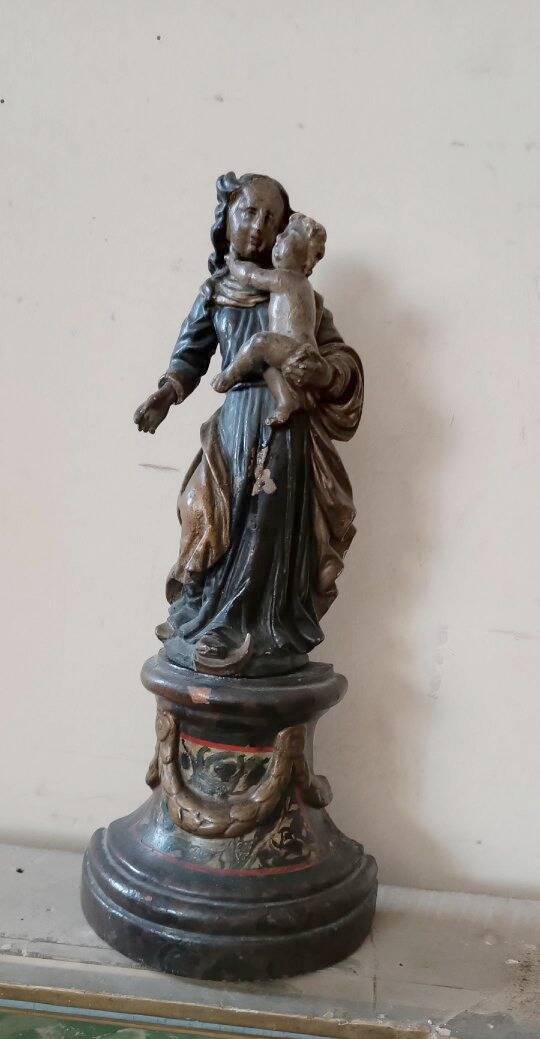 Ancient polychrome wooden sculpture representing the Virgin and Child, from