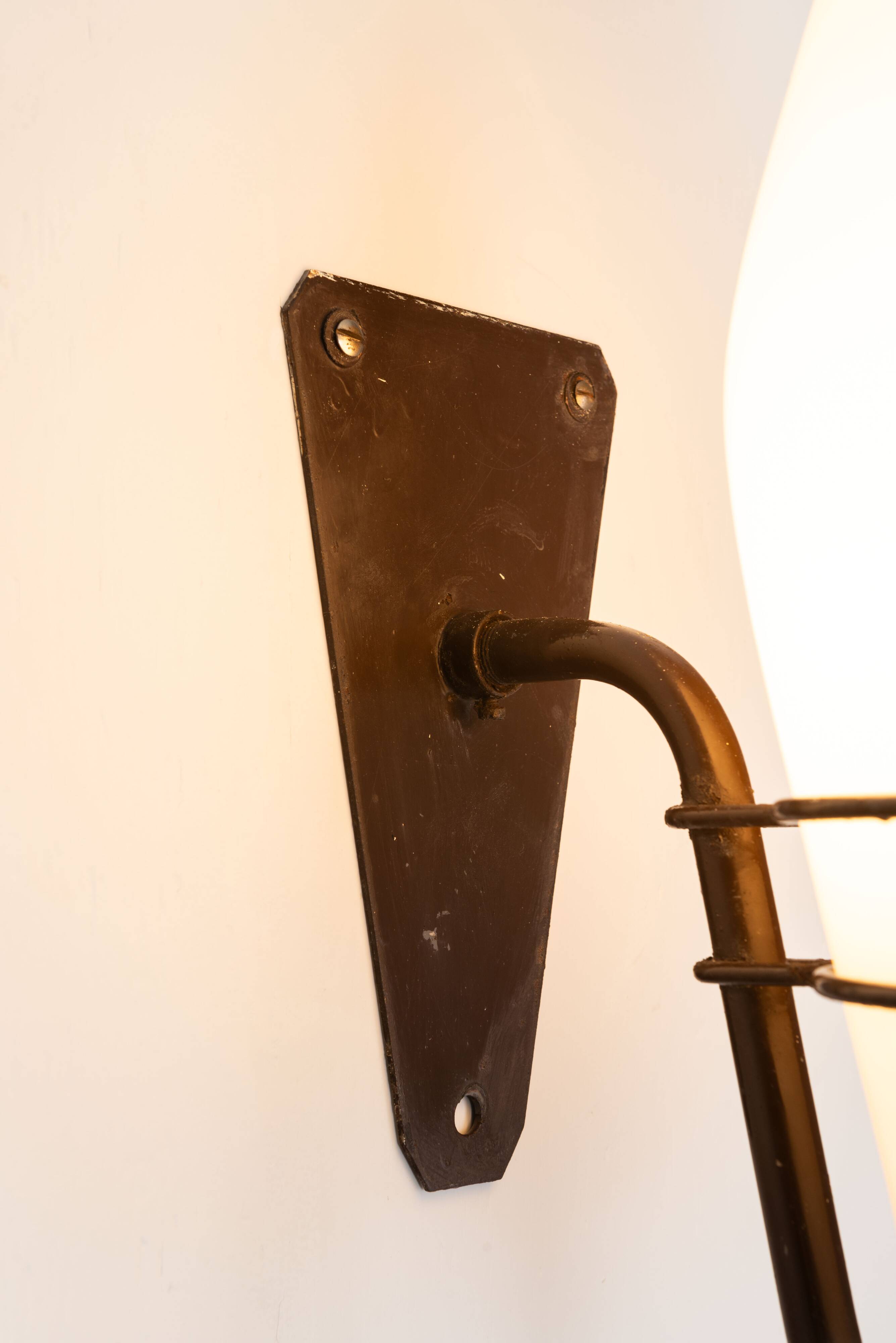 Large outdoor lamp made from metal and opal glass