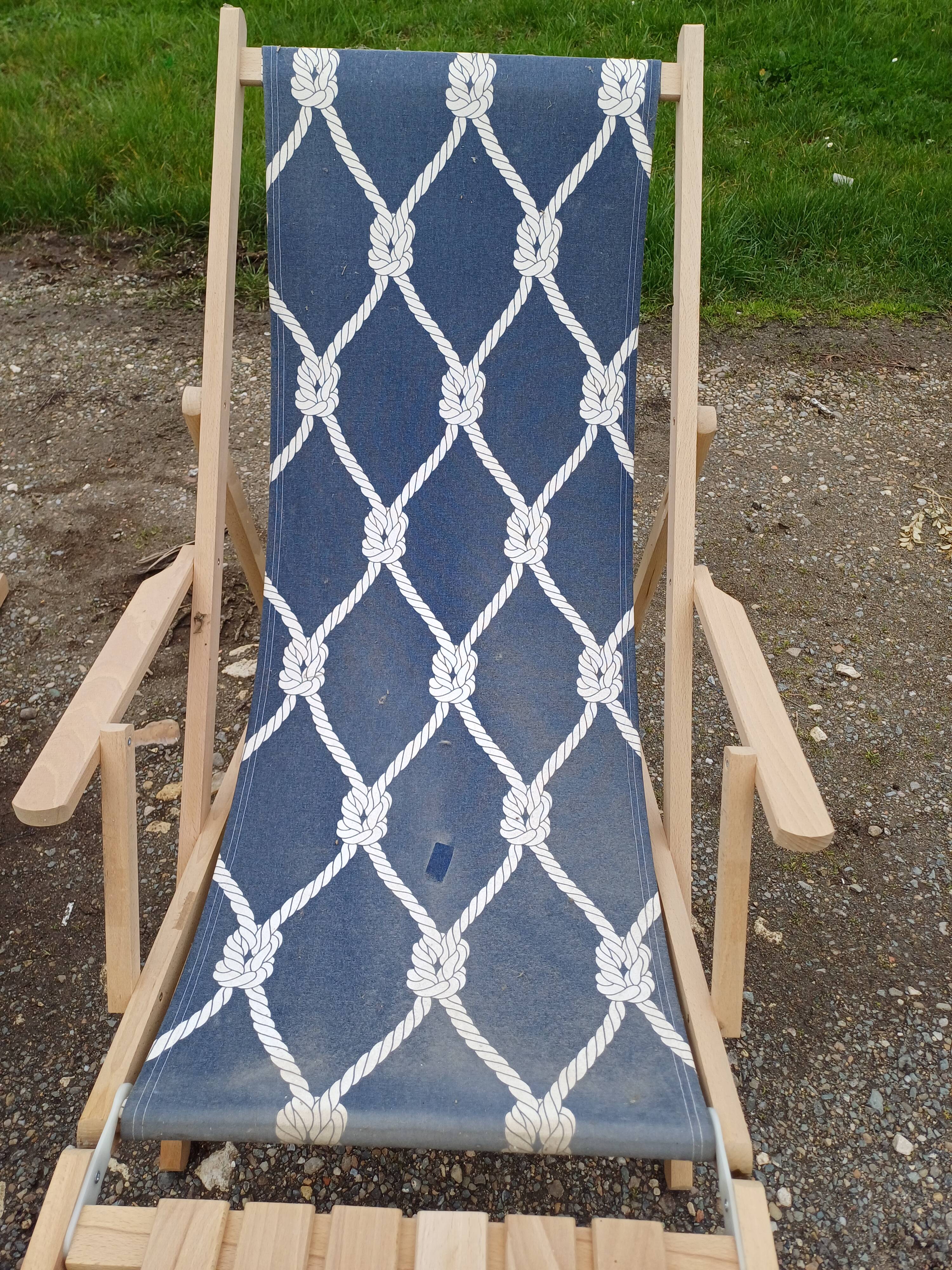 Pair of wood and fabric long chairs