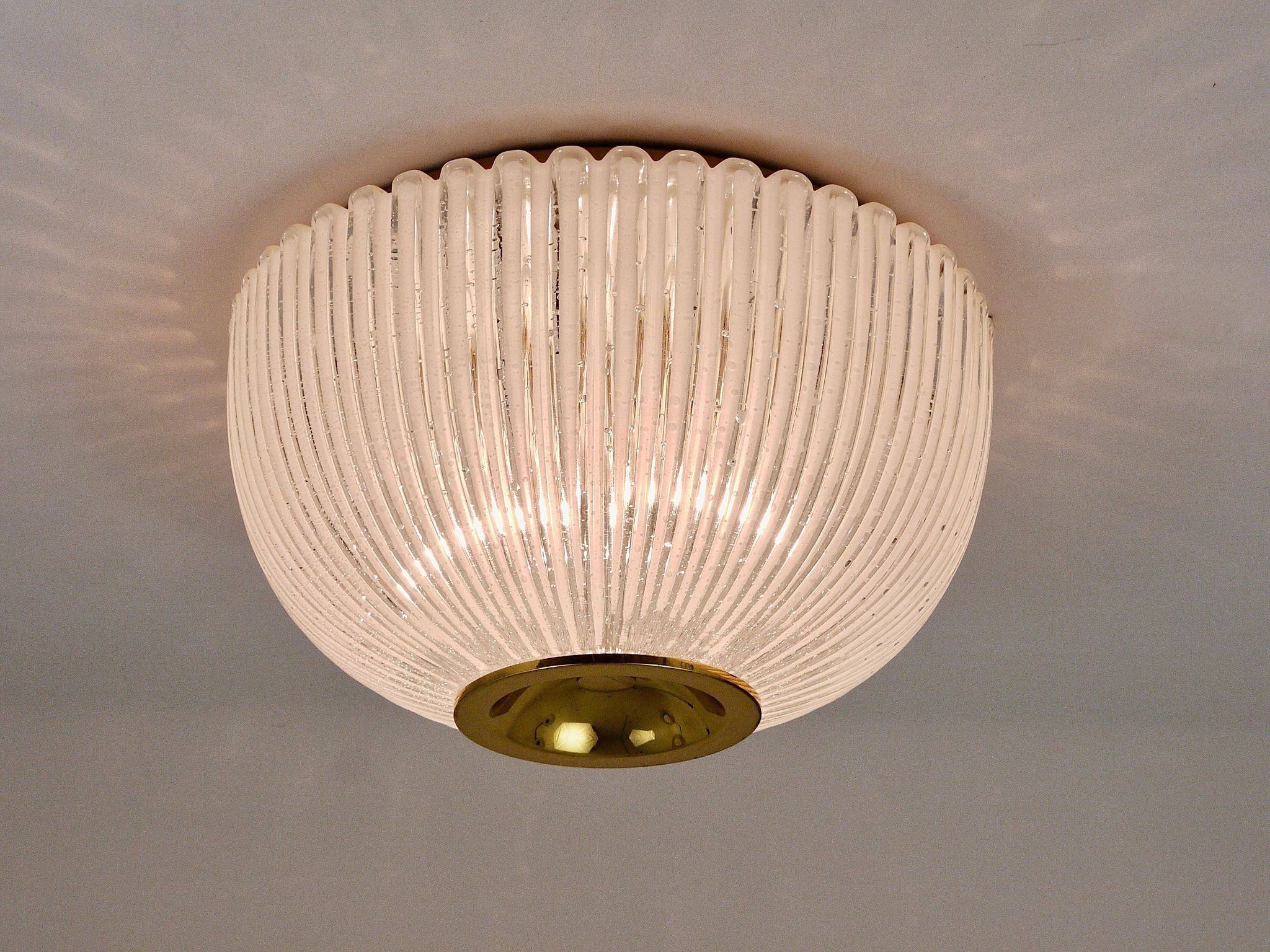 Large striped glass ceiling lamp in brass, Limburg, Germany, 1970s.