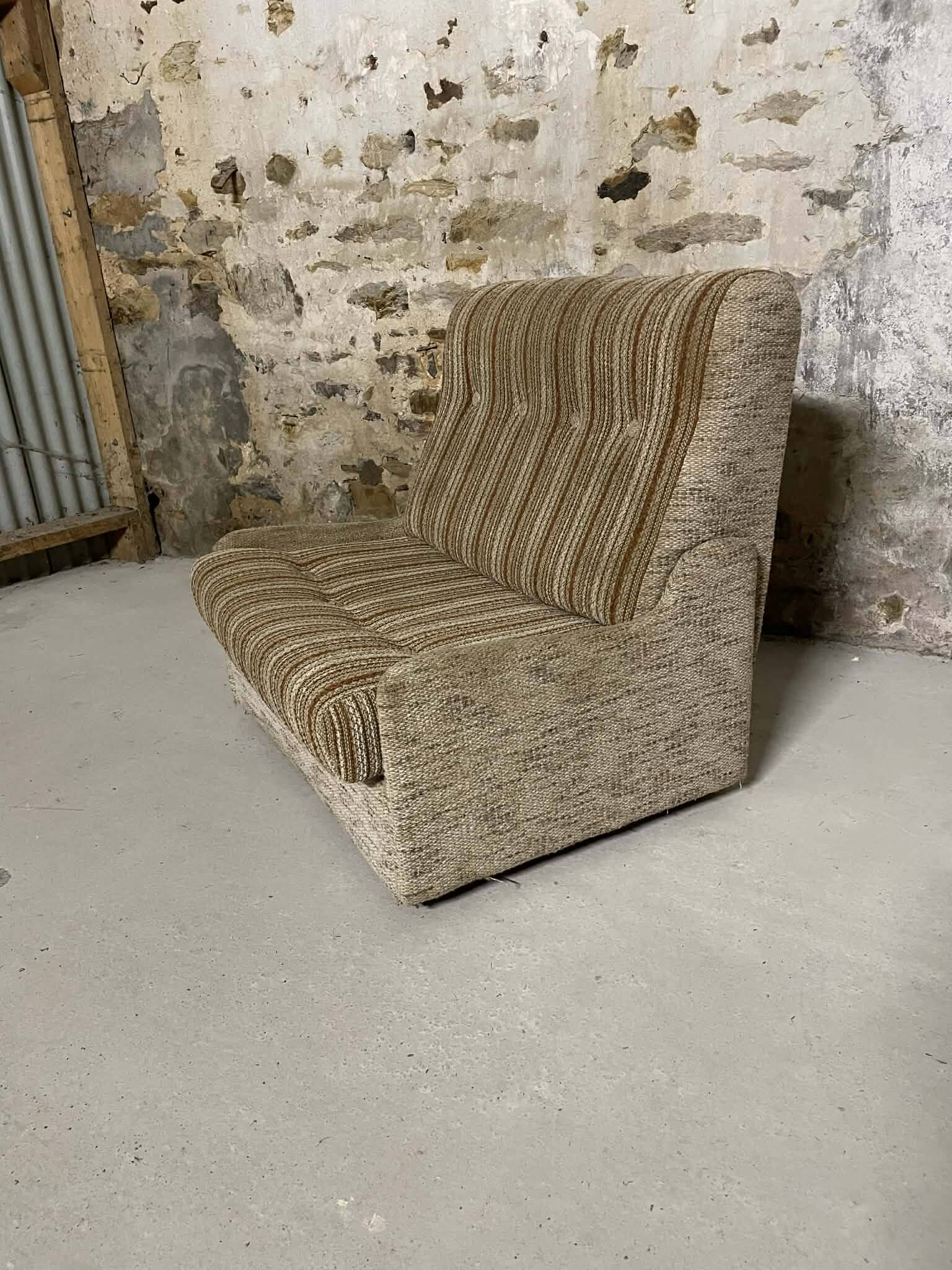 Vintage convertible armchair into a guest bed.