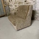 Vintage convertible armchair into a guest bed.