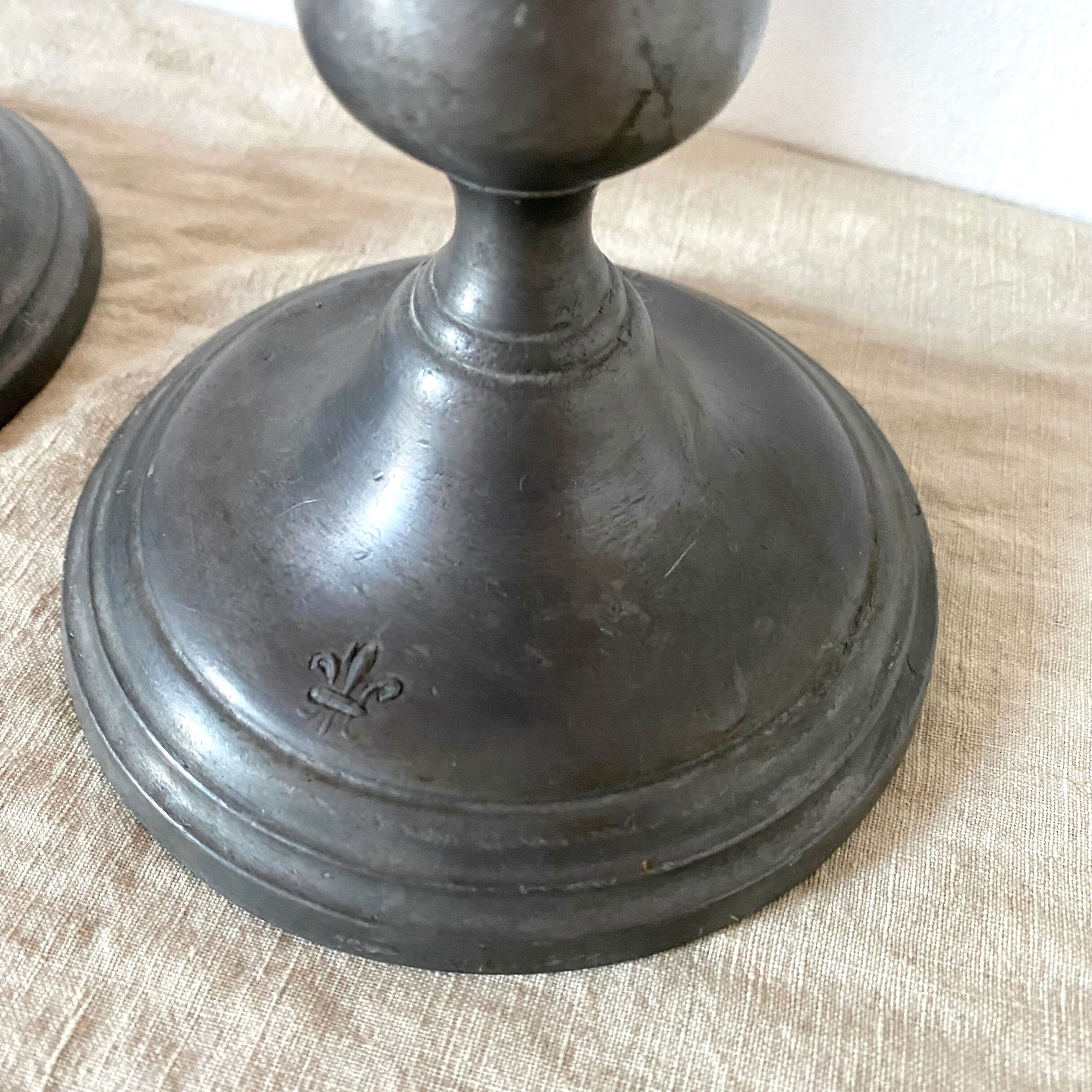 Tin candlesticks