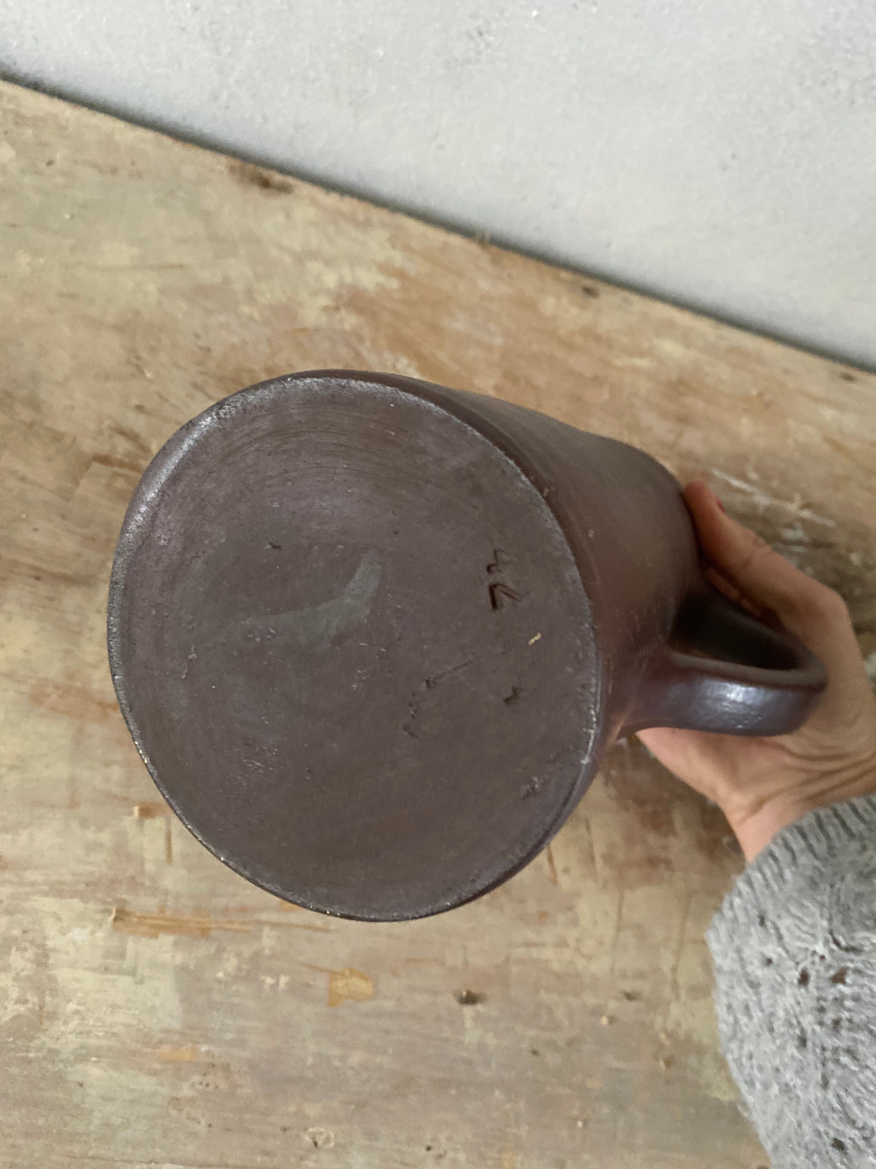 Pitcher in the ground