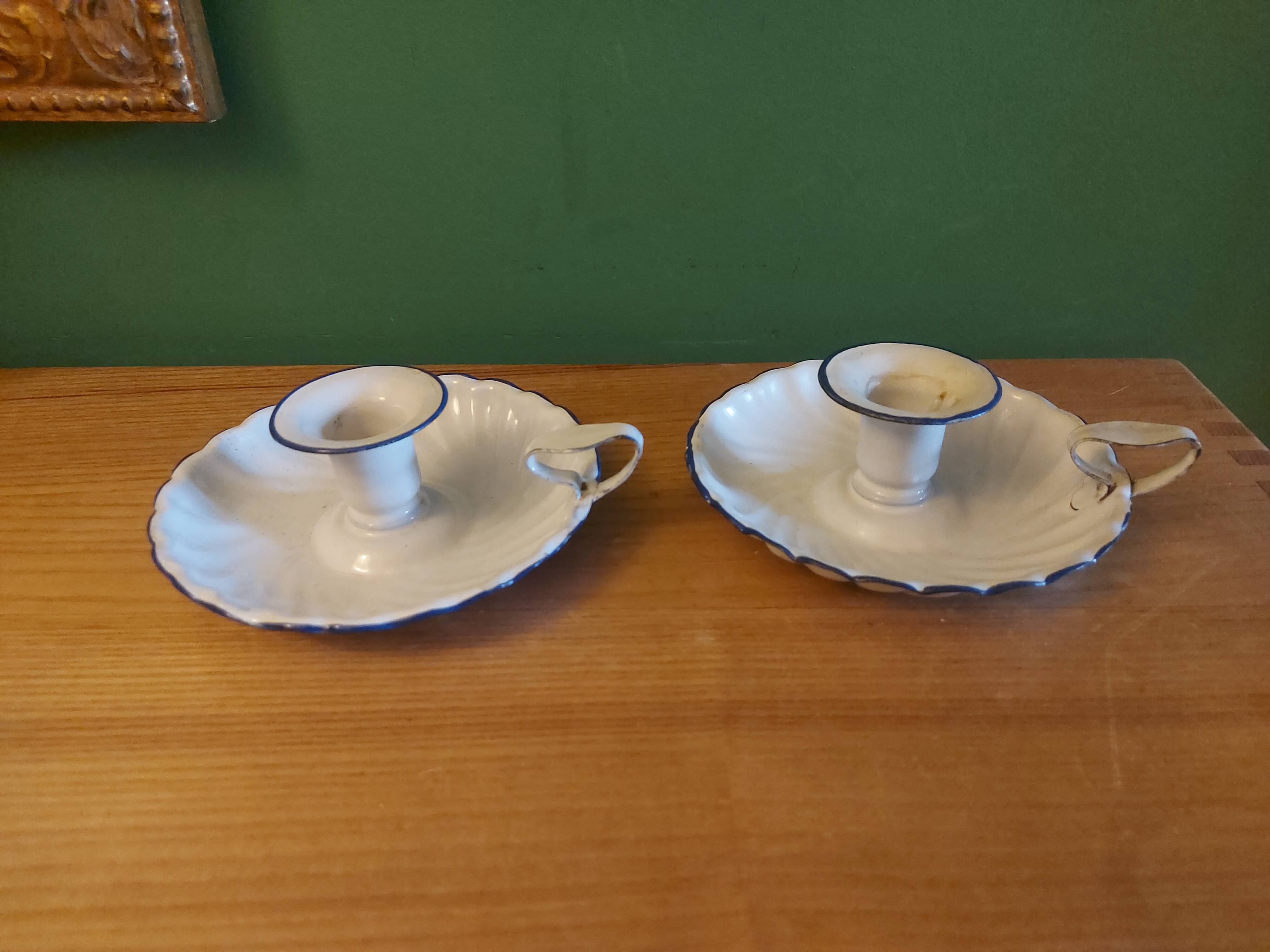 Pair of enamelled candle holders