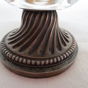 Two candle holders in bronze and crystal