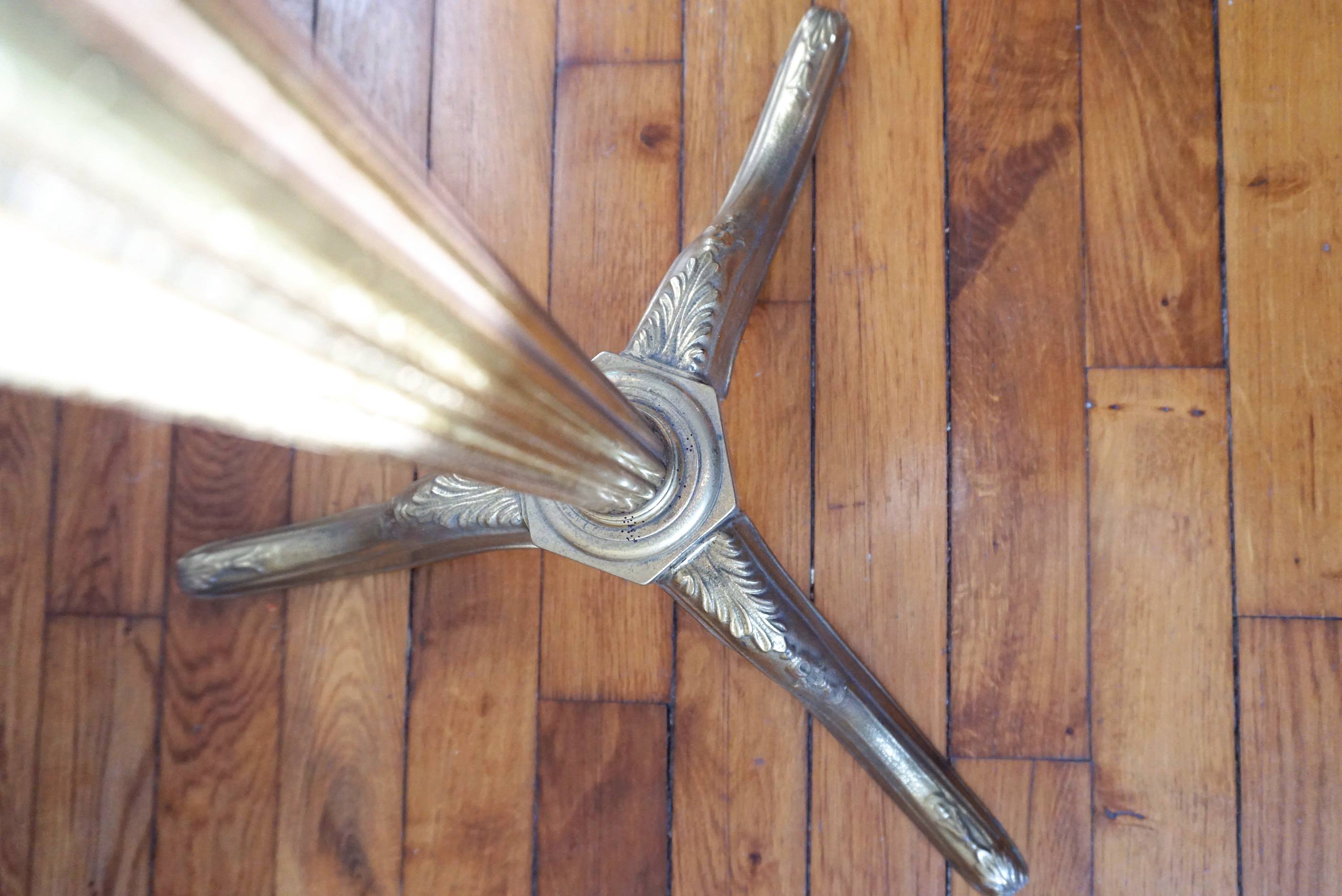 Turning brass coat rack