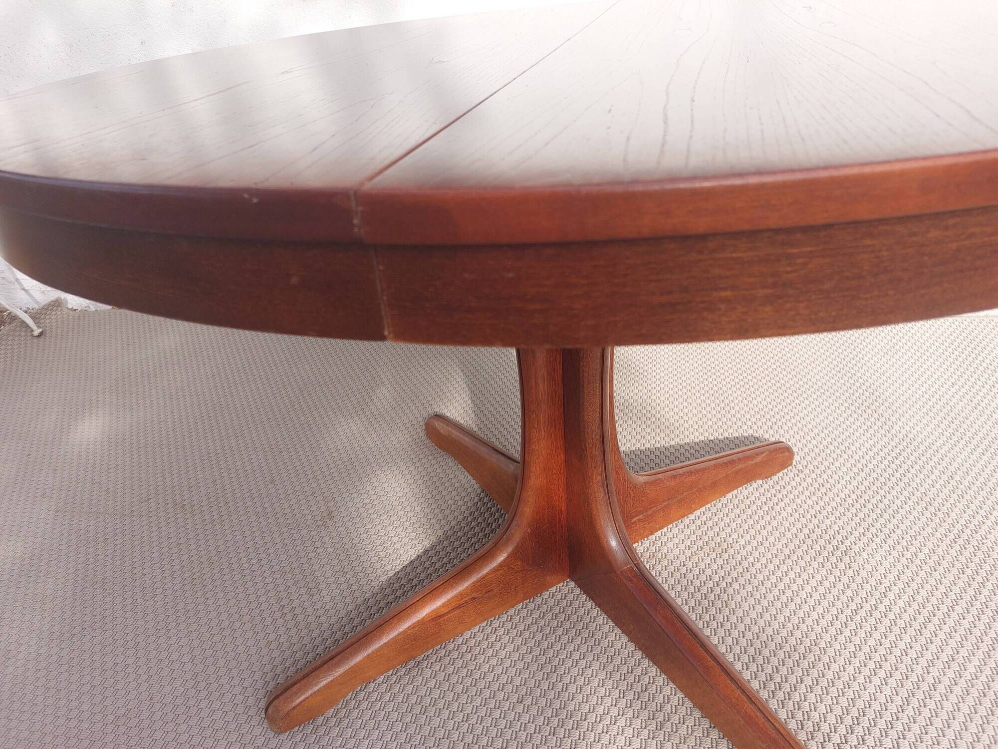 round/oval table with extension, central leg, dark shade, Baumann design