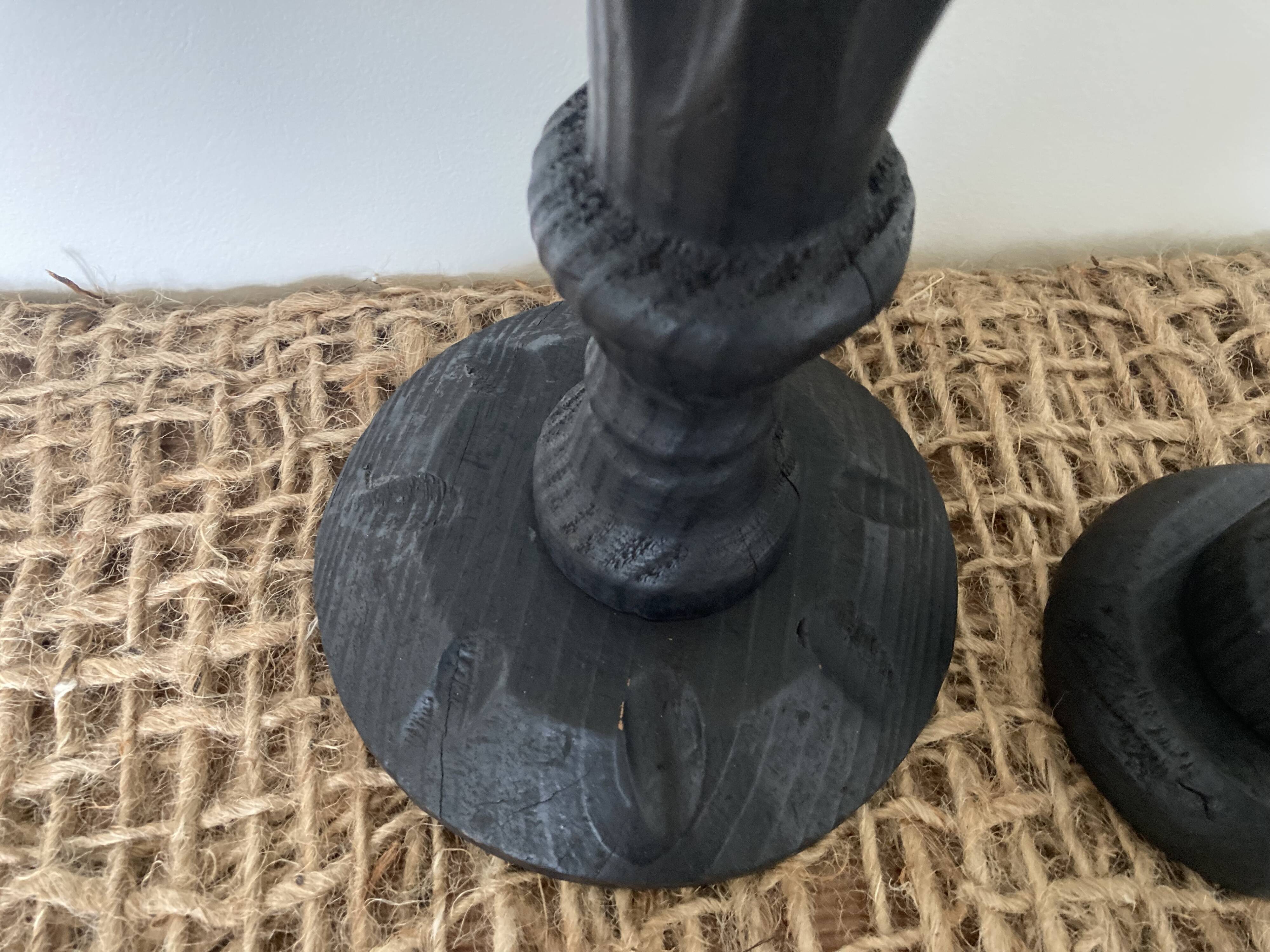 Black wooden candlesticks