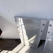 Pair of "Memphis" mirrors from the 80s in chrome and wood.