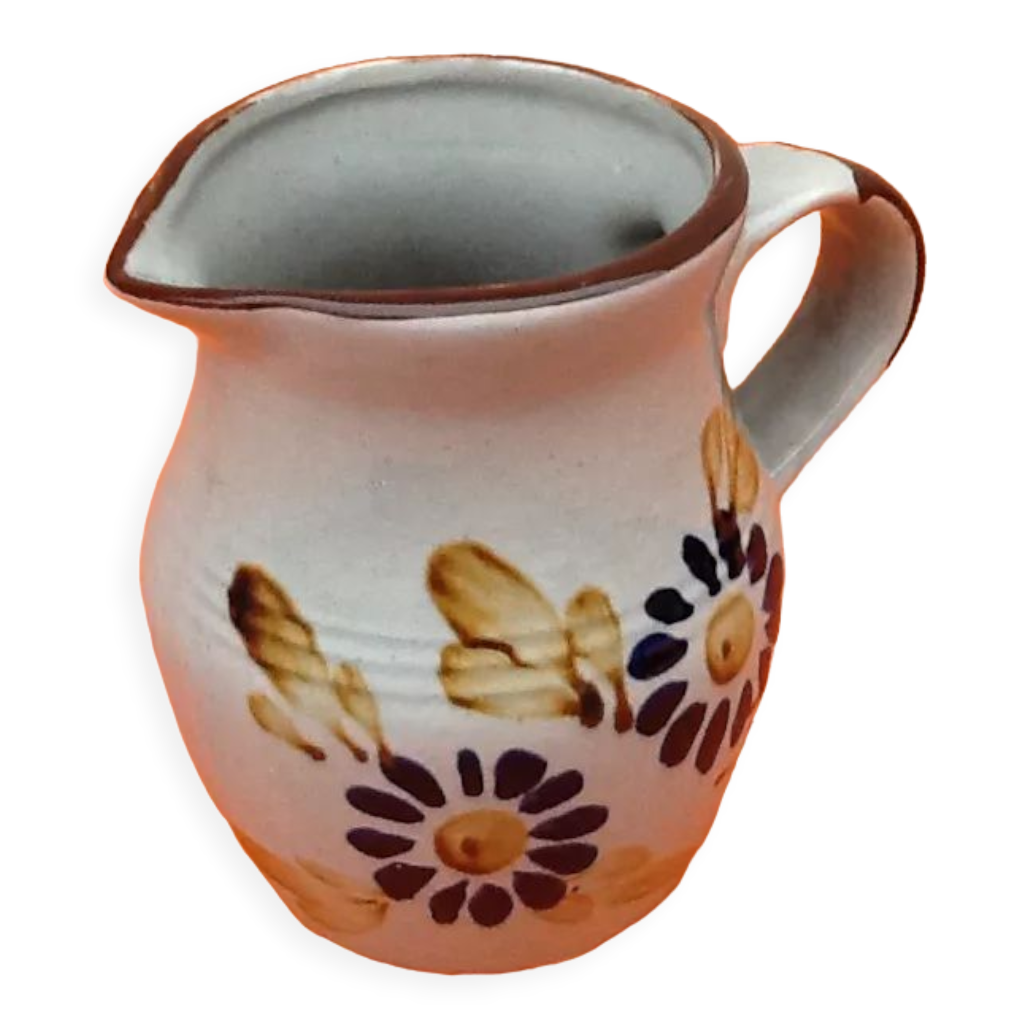 Glazed ceramic pitcher floral decoration