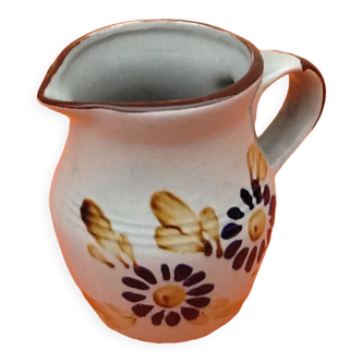 Glazed ceramic pitcher floral decoration
