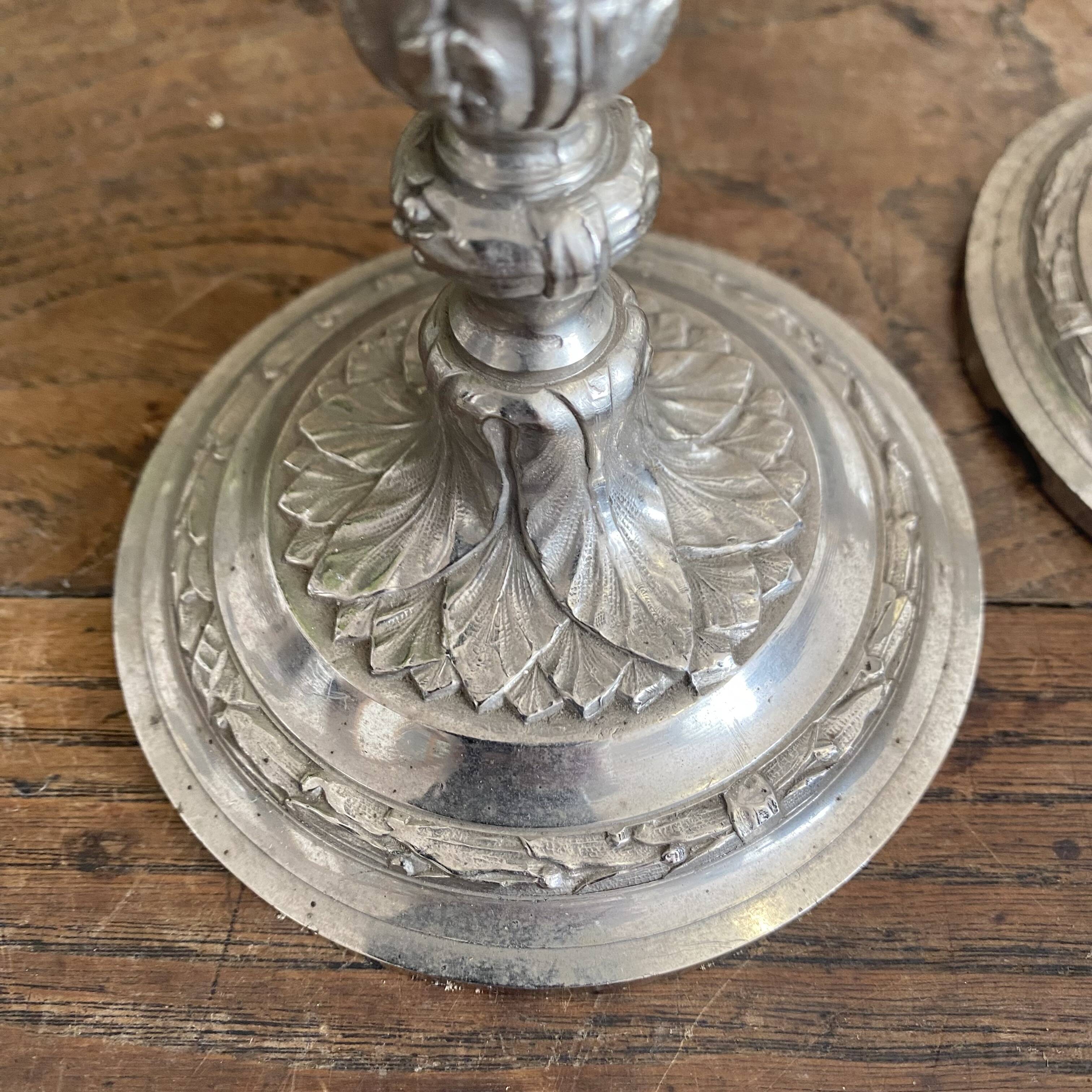 Antique silver-plated metal candlesticks