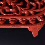 Red cast iron trivet