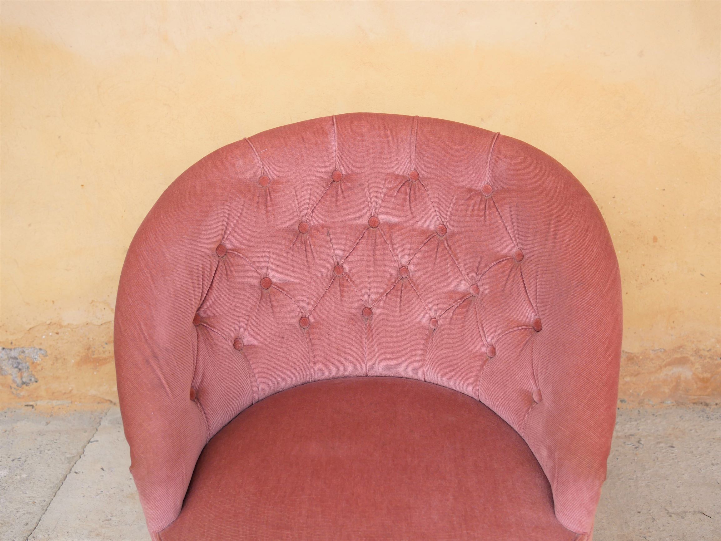Old pink vintage padded "toad" chair
