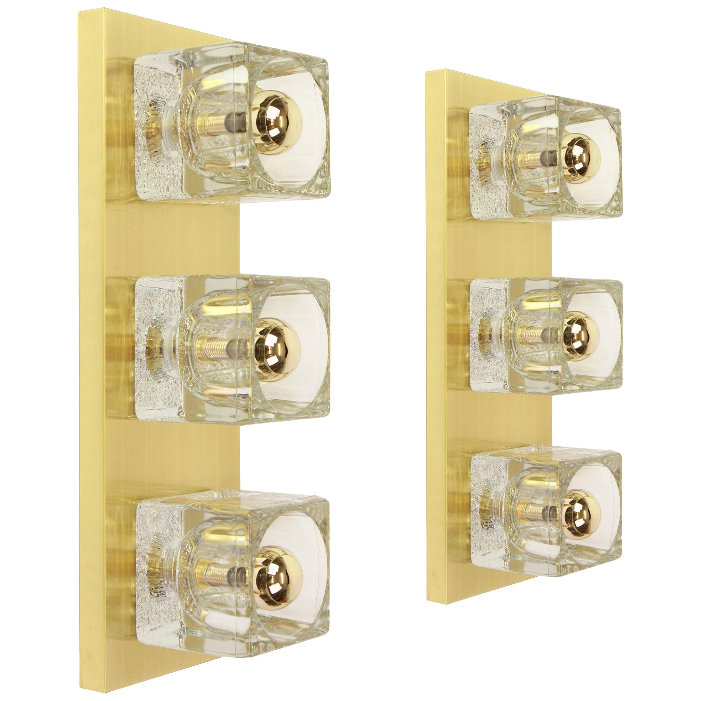 Exclusive wall sconces in crystal and brass by Peill & Putzler, Germany.