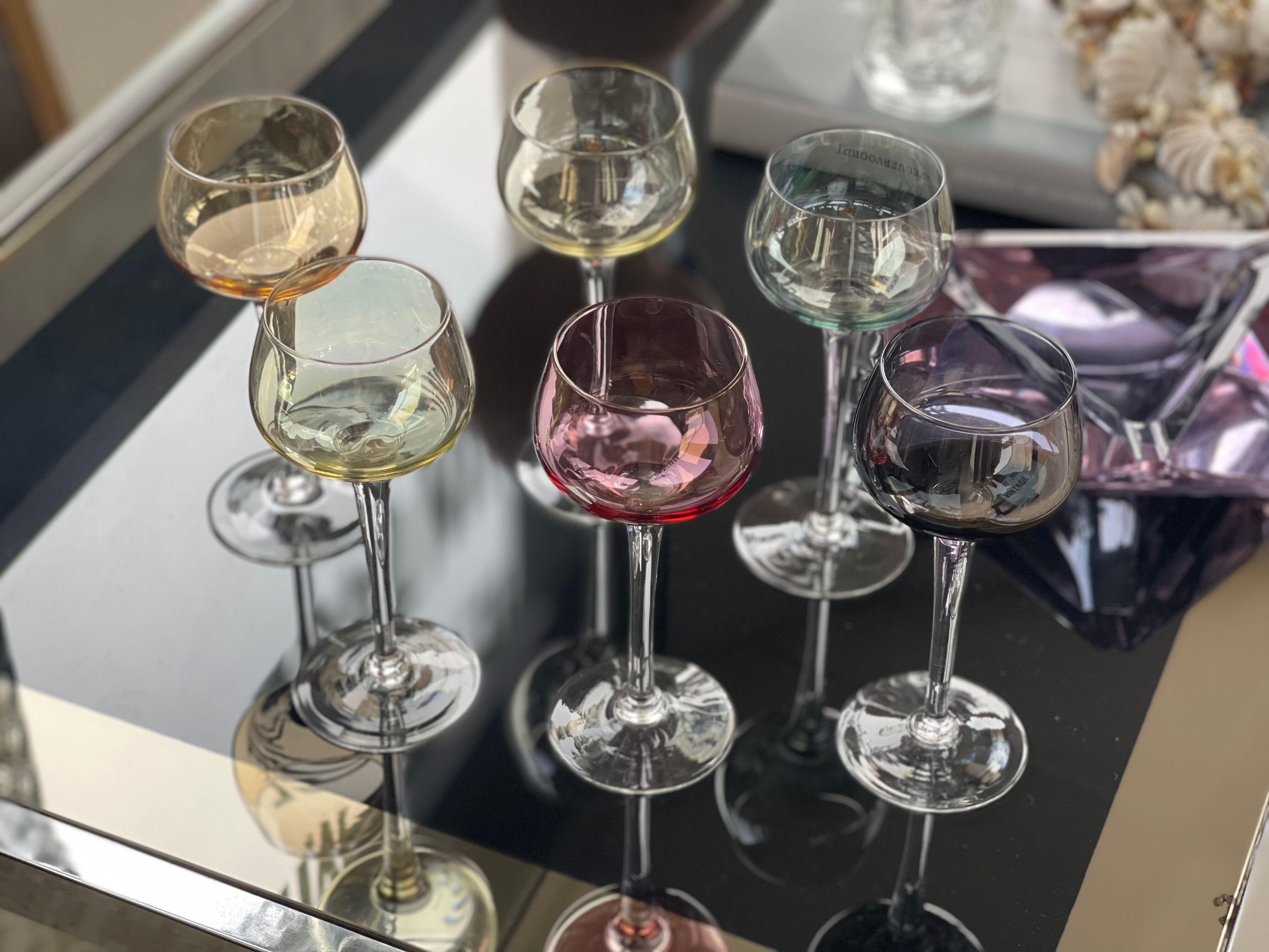 7 vintage iridescent foot glasses