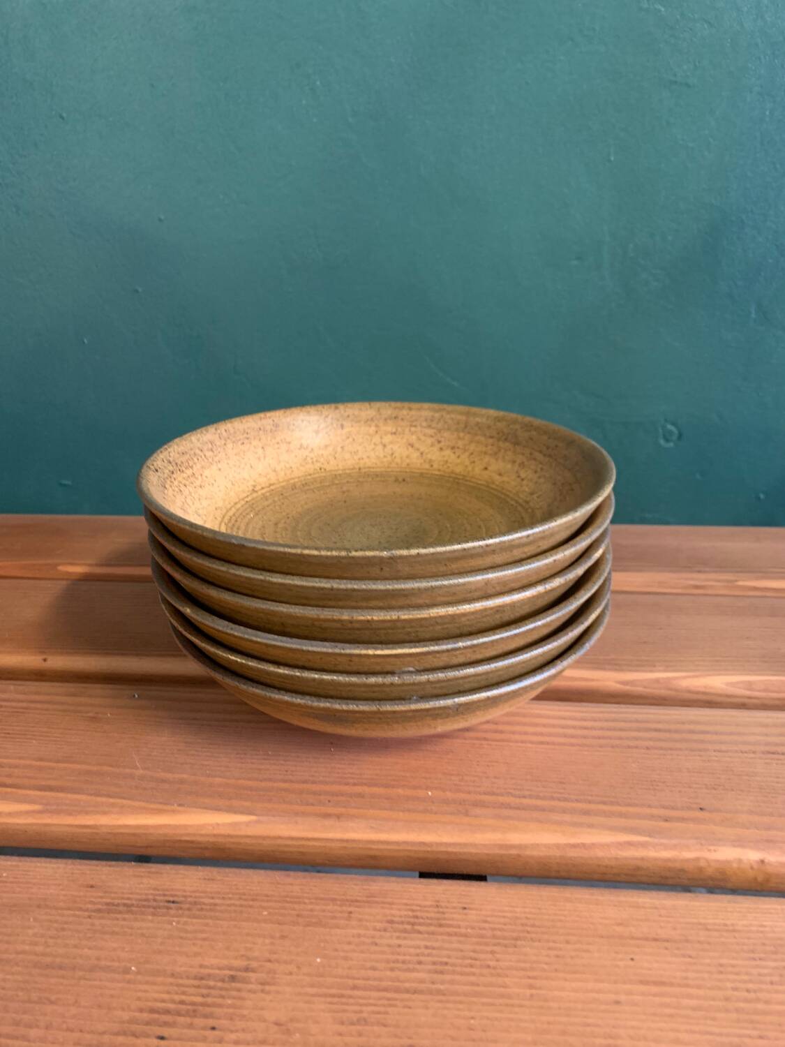 6 Longchamp brown enameled stoneware soup plates, 1970s