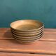 6 Longchamp brown enameled stoneware soup plates, 1970s