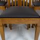Set of 6 Art Nouveau chairs and armchairs in oak and leather.