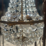 Basket chandelier with crystal and gilded brass pendants, circa 1930.