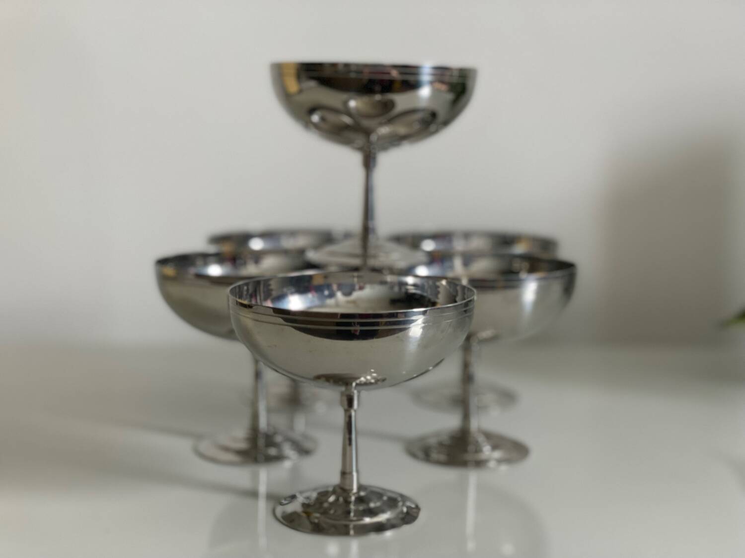 Six Guy Degrenne stainless steel ice cream cups.