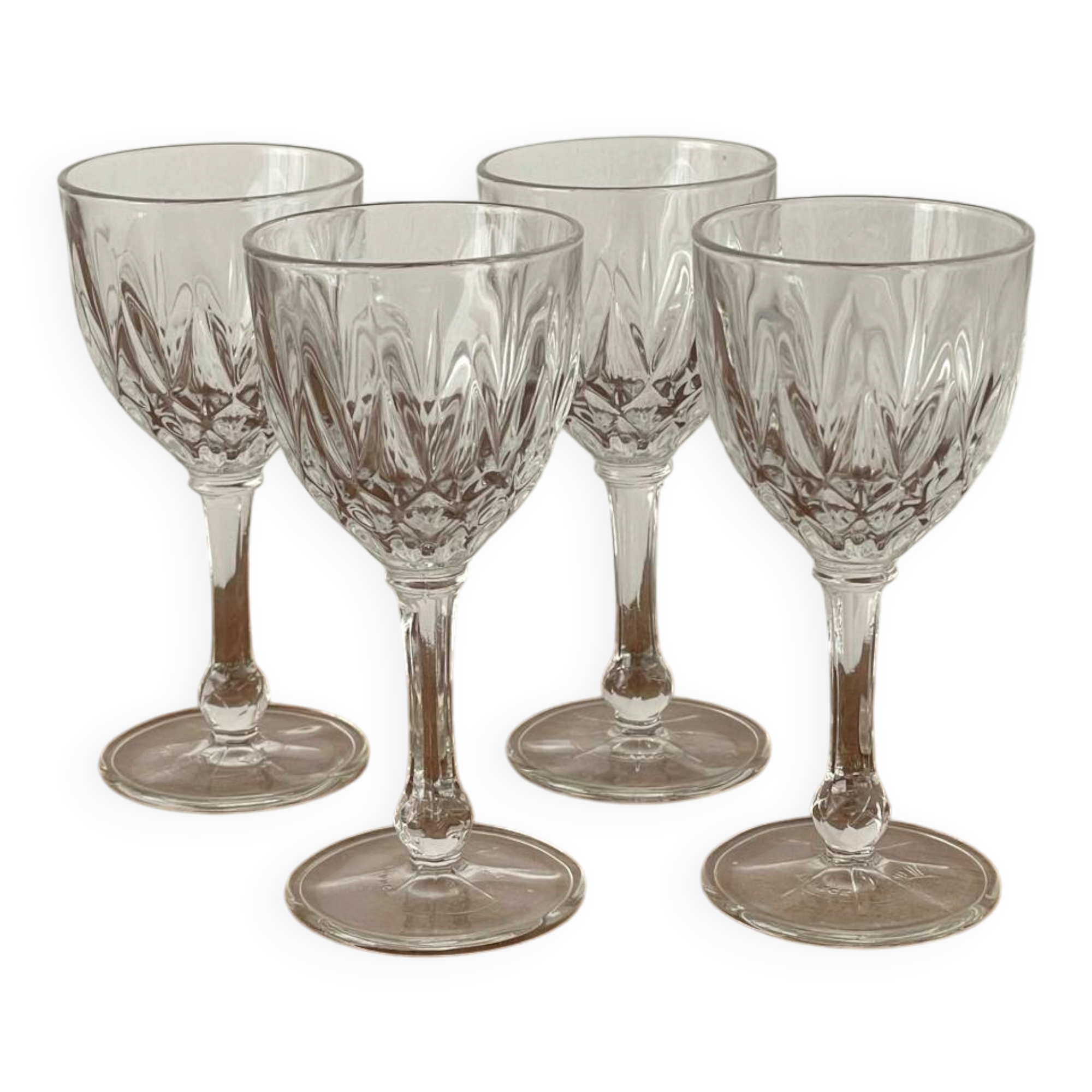 4 cut glass liqueur glasses on stems