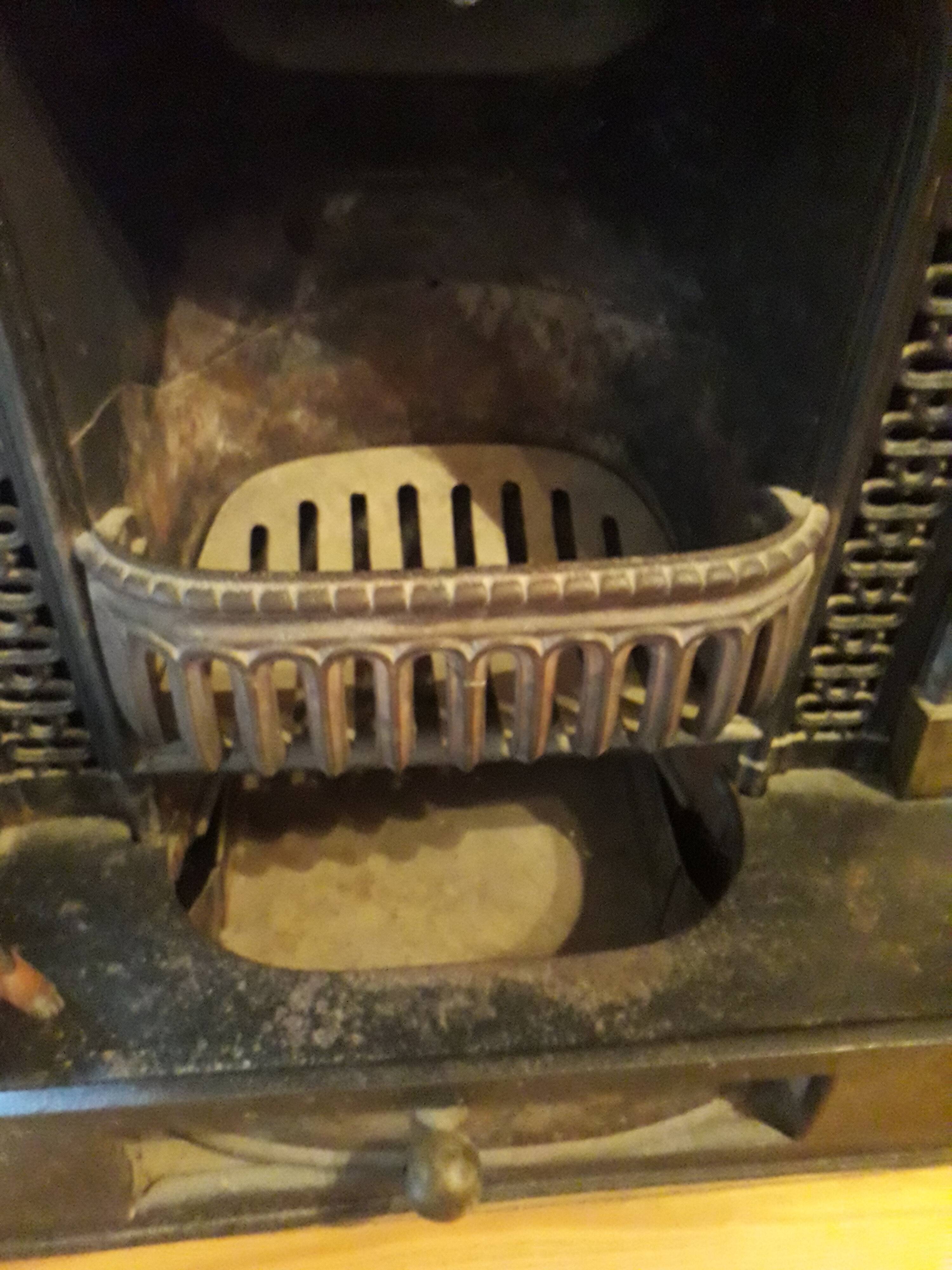 Old black marble fireplace