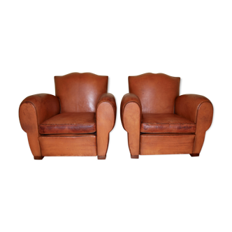 Pair of 'moustache' club chairs in leather