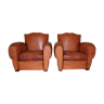 Pair of 'moustache' club chairs in leather