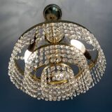 Cascade chandelier with crystal and brass tassels