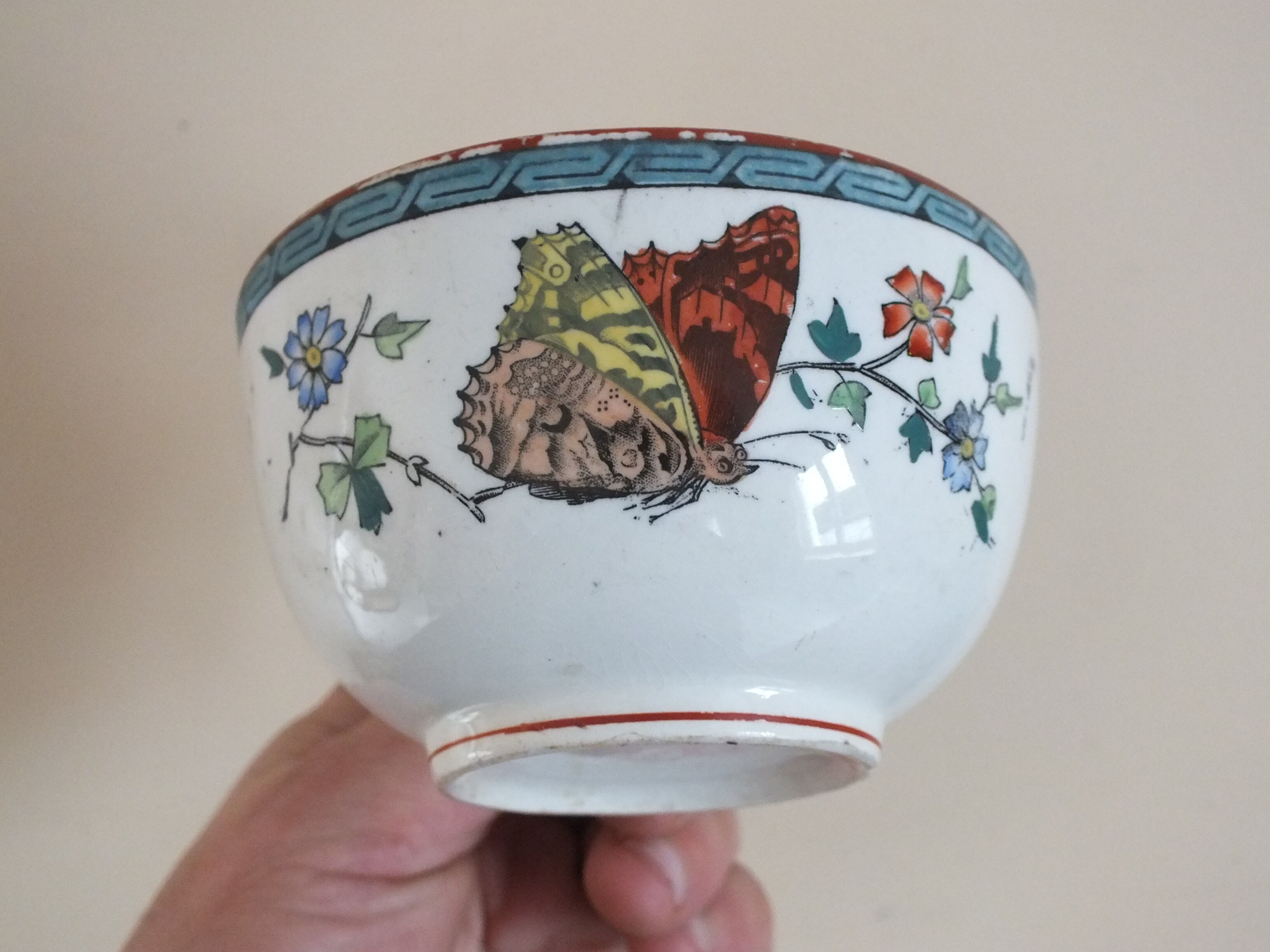3 cups of English porcelain decorated with butterflies