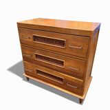 Vintage 1970s chest of drawers: wood and rattan, splayed legs.