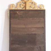 Golden mirror in the Louis XVI style from the 20th century.