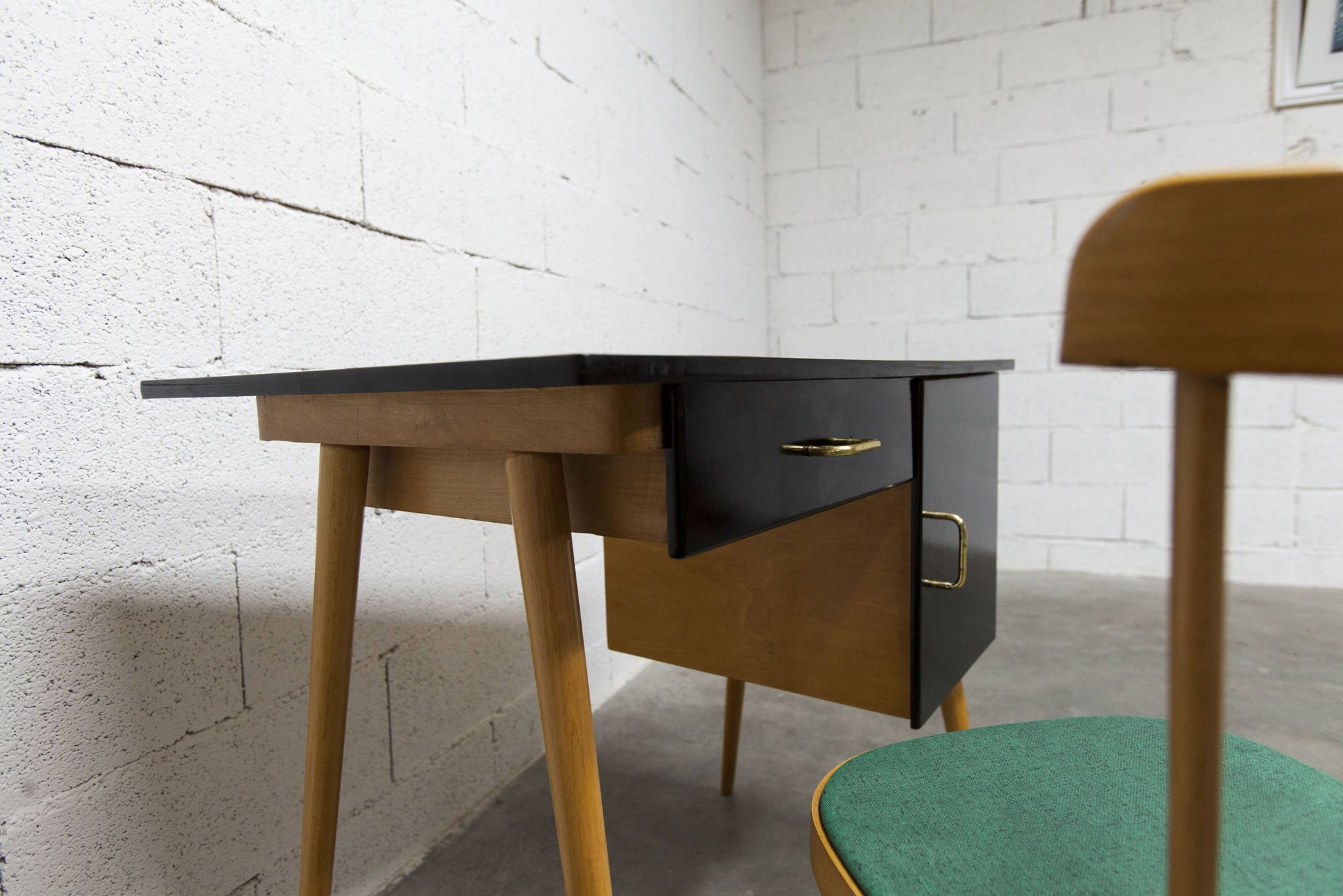 Baumann desk and chair, 1960s, Formica, wood and black, green seat