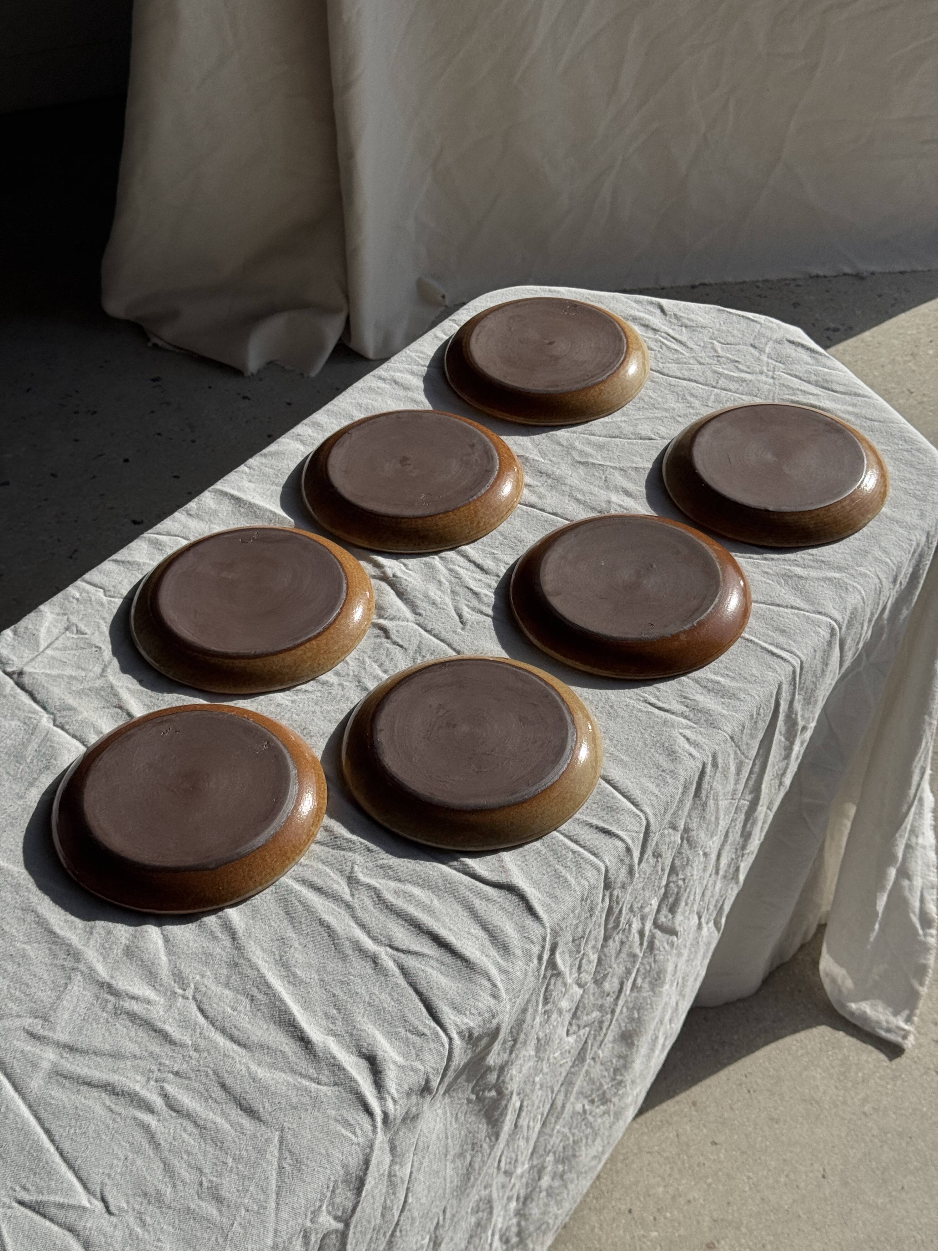Set of 7 small flat dessert plates in orange stoneware D18