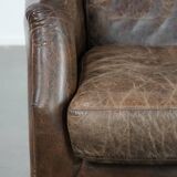 Very comfortable vintage cow leather armchair with character
