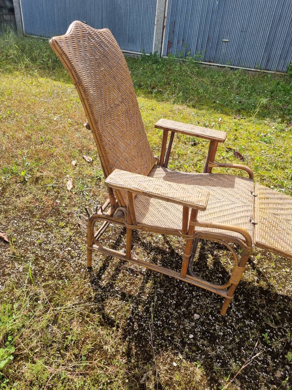 Old vintage rattan lounge chair