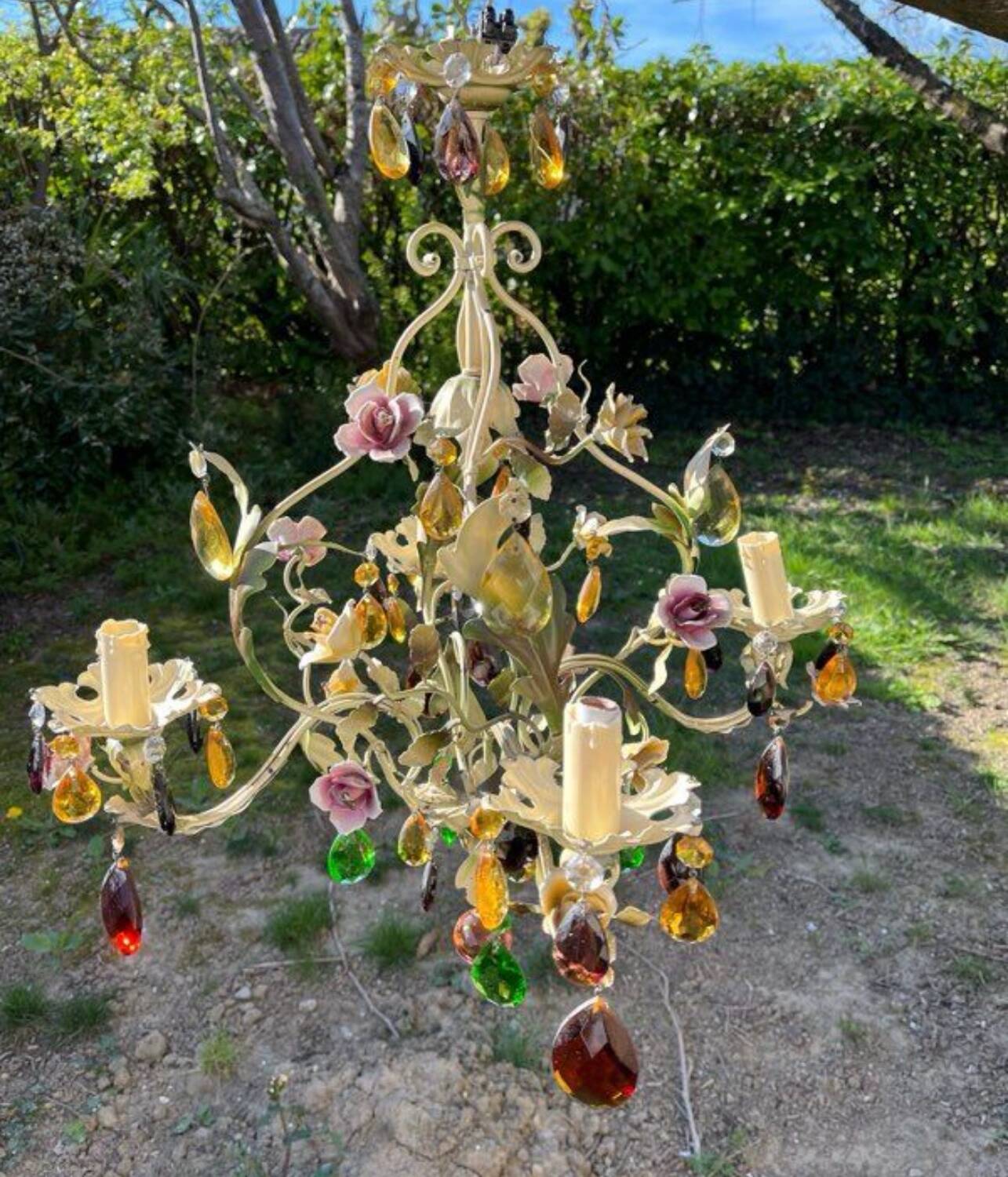 Vintage metal chandelier with porcelain flowers.