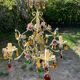 Vintage metal chandelier with porcelain flowers.