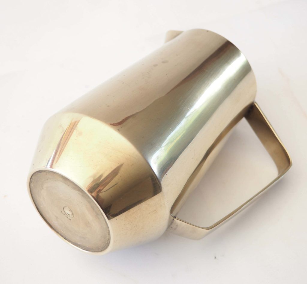 Duo of bronze pitchers