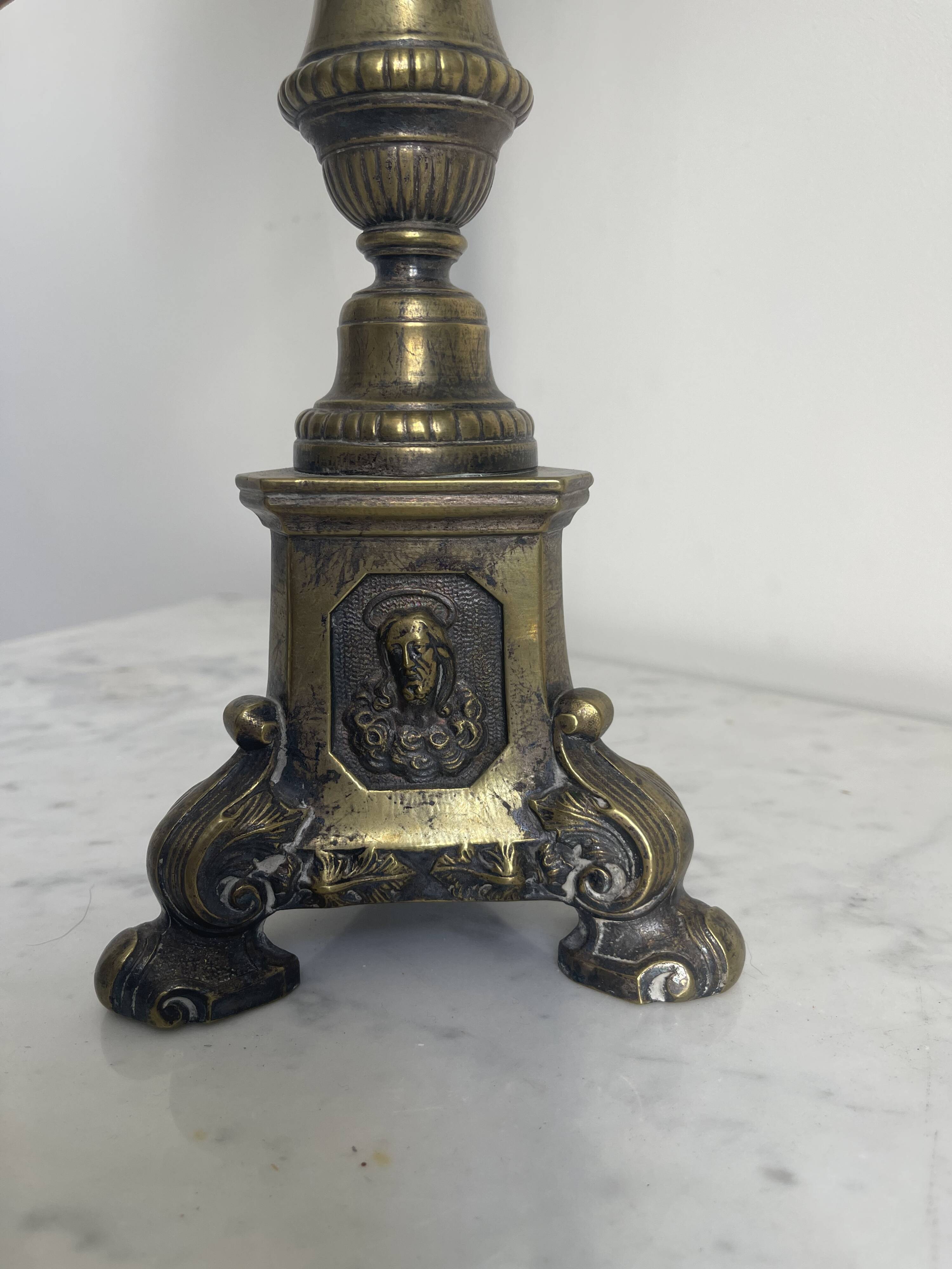 Old candle holder transformed into a lamp.