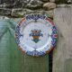 Old Gien earthenware scalloped plate with blue/yellow flower basket motifs