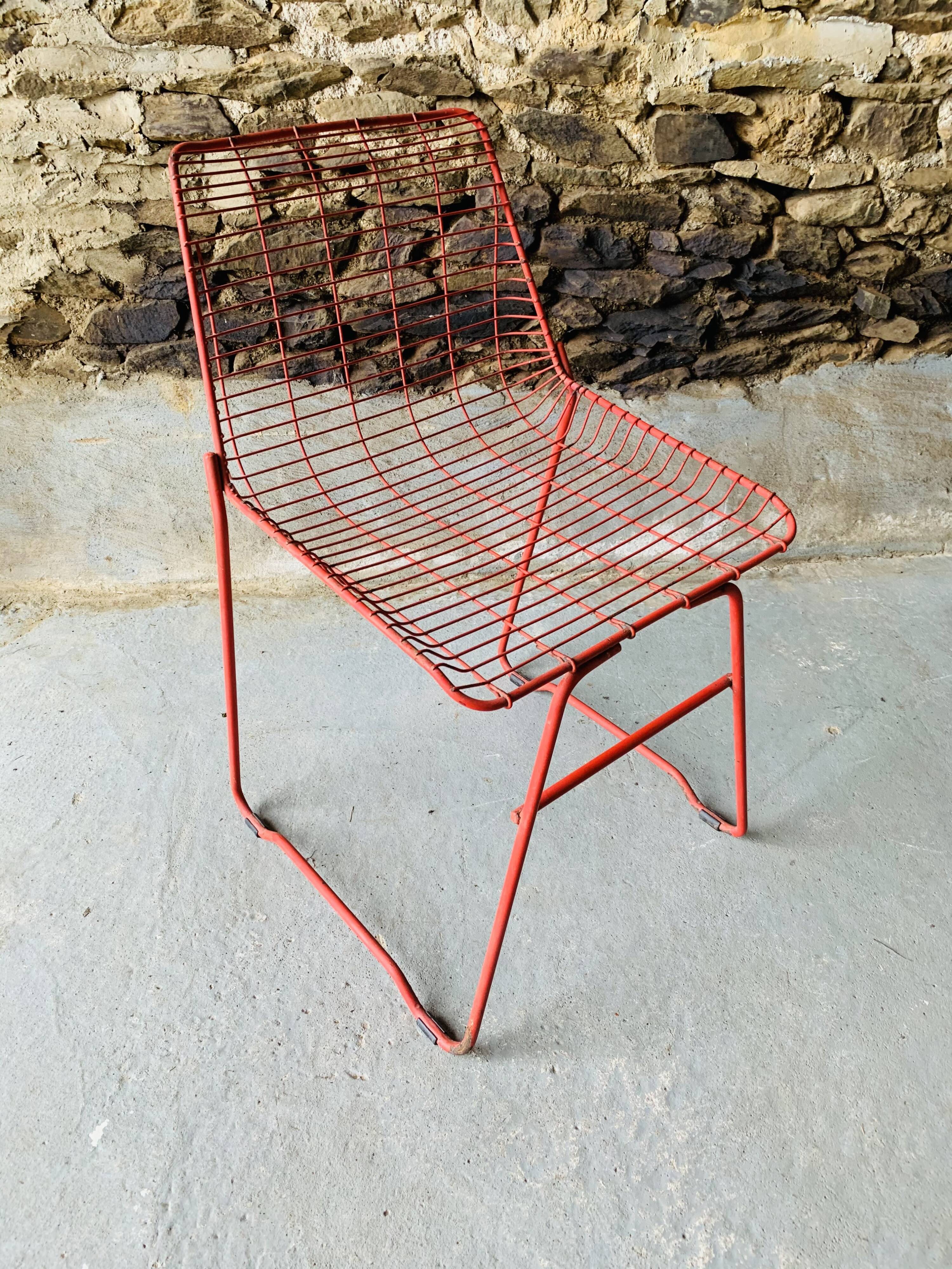4 red design chairs