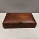 Wooden trinket box for storing jewellery, cigarettes or similar items.